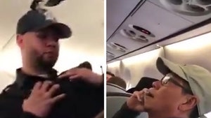 United Passenger Tells Cops to Drag Him Off Plane (VIDEO)