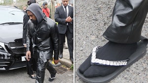 Kanye West Wears Bedazzled Flip-Flops for London Fashion Week