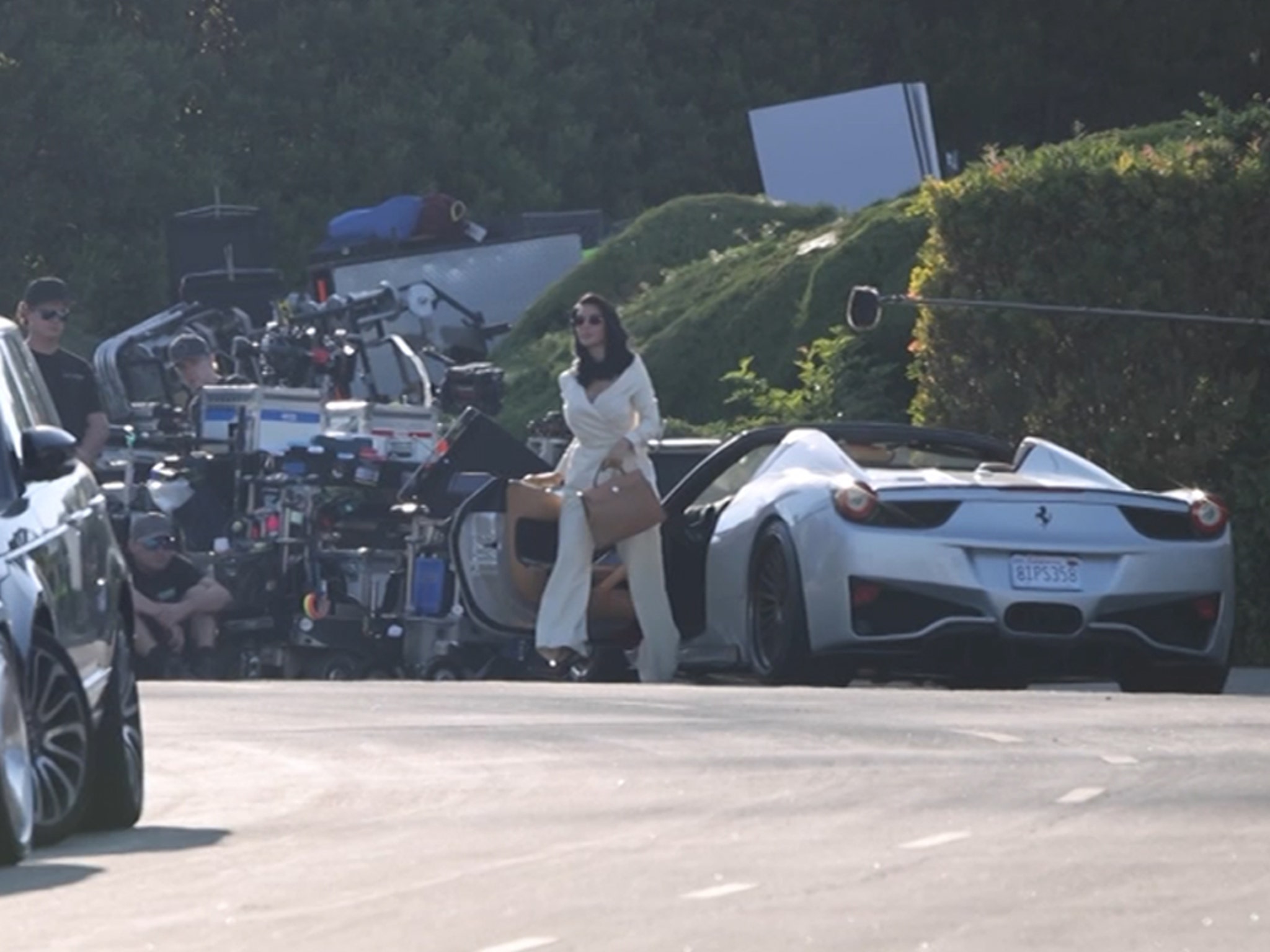 Kim Kardashian Matches White-Hot Suit & Ferrari for 'All's Fair' Scene