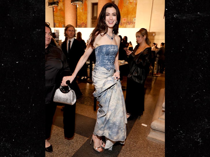 Anne Hathaway Dresses Up Denim with Diamonds at the CFDAs