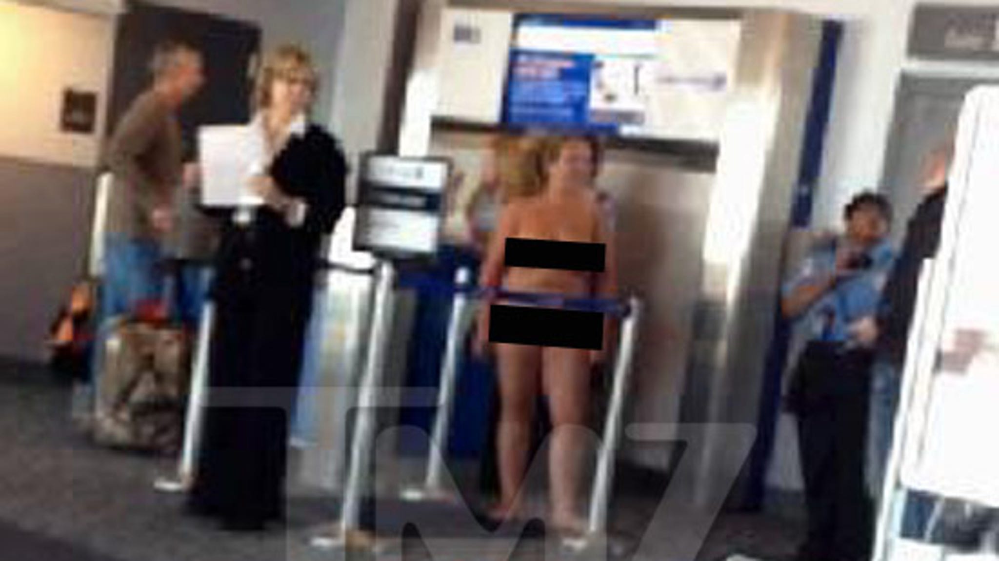 Woman Strips Naked at Denver Airport.