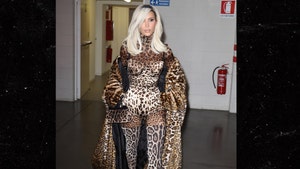 Kim Kardashian Wears Leopard Print Bodysuit After Dolce & Gabbana Showcase
