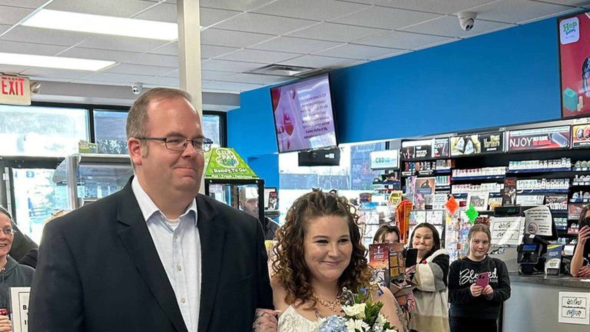 Tiana and Logen Abney's Gas Station Bathroom Wedding Photos
