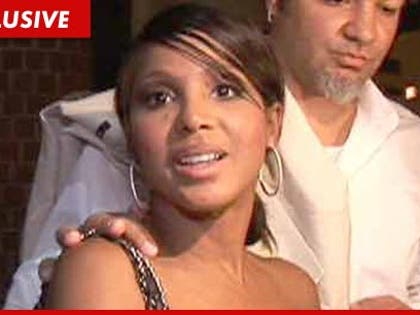 011212_toni_braxton_tmz_EX