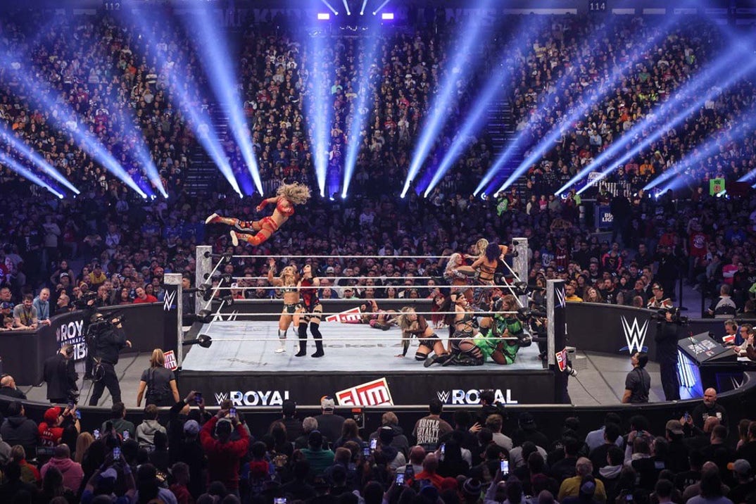 Charlotte Flair goes airborne on her way to winning the Women's Royal Rumble.