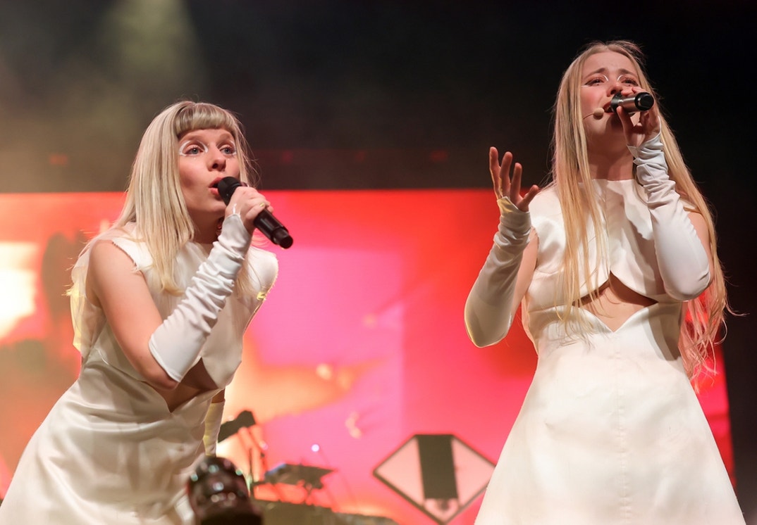 Amalie Holt Kleive (R) performs with AURORA of TOMORA