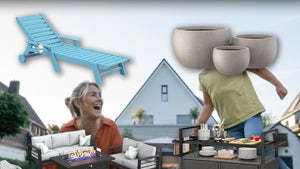 Family Sitting Outdoors Surrounded By Outdoor Furniture