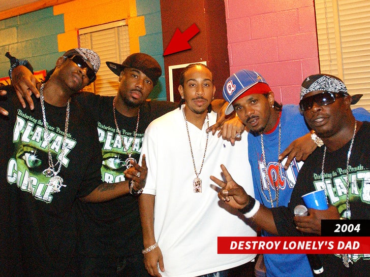 DTP members Titty Boy, I-20, Fate, Dollar with Ludacris sub arrow swipe getty