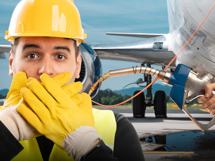 airplane worker loses control of hose getty 1