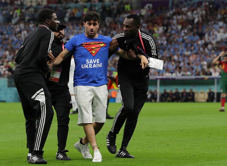 Protester with Pride flag disrupts World Cup game