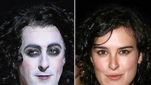 Alan Cumming and Rumer Willis