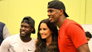 Demi Lovato Volunteers in Houston with Kevin Hart & Chris Paul