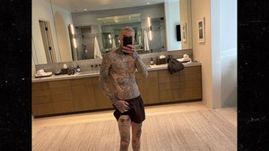 Travis Barker Shows Off Tattoo of Kourtney Kardashian's Eyes On His Leg