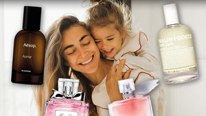 Mother And Daughter Hugging Surrounded By Fragrances