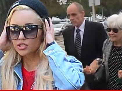 1105-amanda-parents-tmz-01