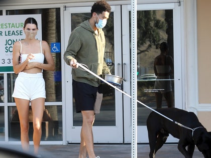 0818 Devin Booker and Kendall leaving pet shop backgrid