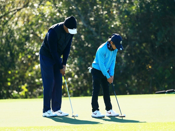 Tiger Woods Golfing With His Son Charlie Woods