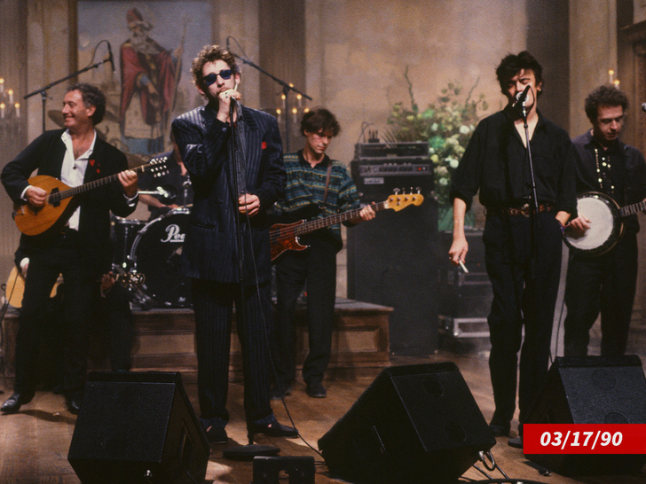 the pogues performing onstage