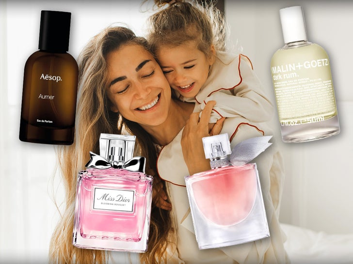 Mother And Daughter Hugging Surrounded By Fragrances