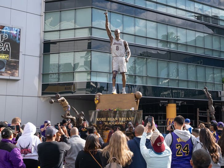 Fans Gather At Kobe Bryant's Statue