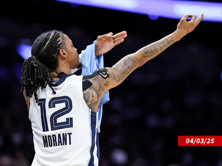 ja morant hand guns signal memphis grizzlies sub getty swipe