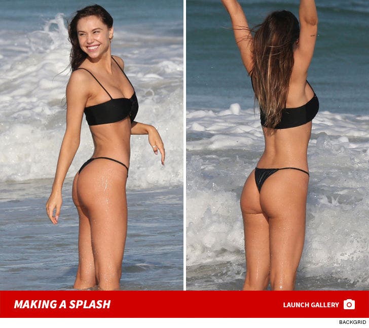 Alexis Ren Makin' Waves In Tiny Black Bikini