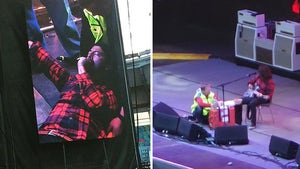 Dave Grohl -- Breaks a Leg On Stage ... FOR REAL!!! (VIDEO)
