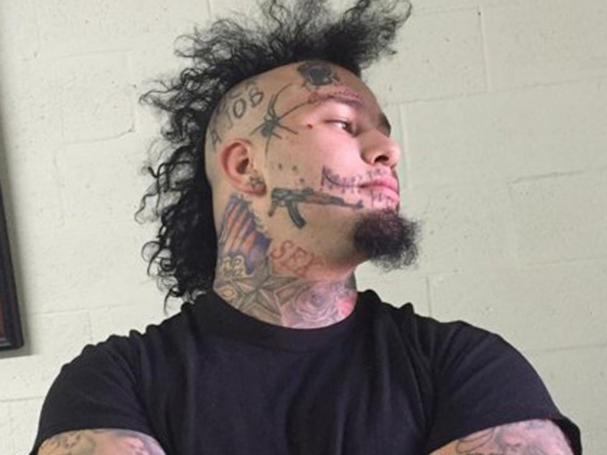 Rapper Stitches Gets a Brutal Face Tattoo