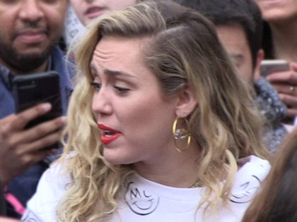 0603-miley-cyrus-tmz-01