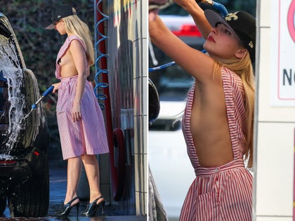 Addison Rae Washing Her Car In A Revealing Red And White Dress