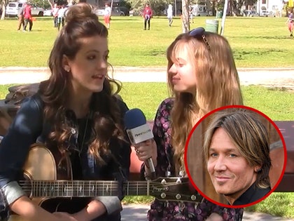 100725_keith_urban_guitarist_primary