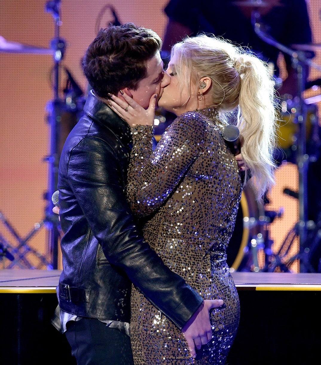 After performing “Marvin Gaye,” Charlie Puth and Meghan Trainor went for a very steamy on-stage kiss that immediately blew up online. Even though the majority deemed the kiss cringe, it still holds down as a legendary AMA's moment!
