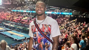 Jonathan Owens showed up to the women’s gymnastics team final with the GREATEST shirt