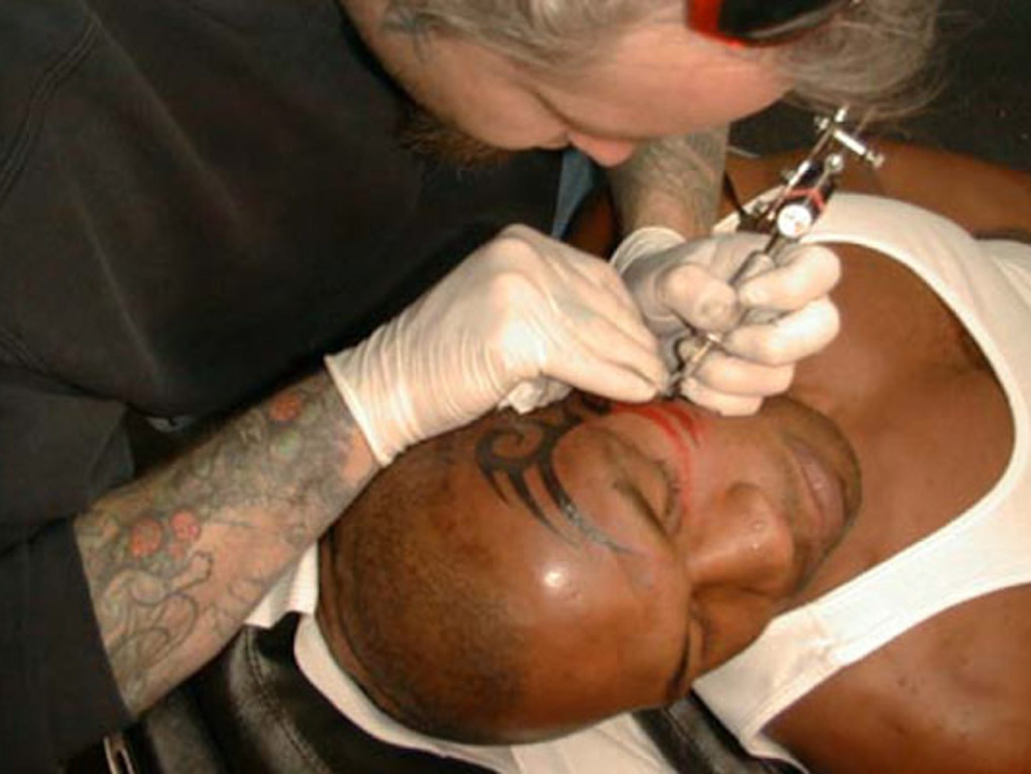 Mike Tyson  Just received a fans tattoo What do you think  Facebook