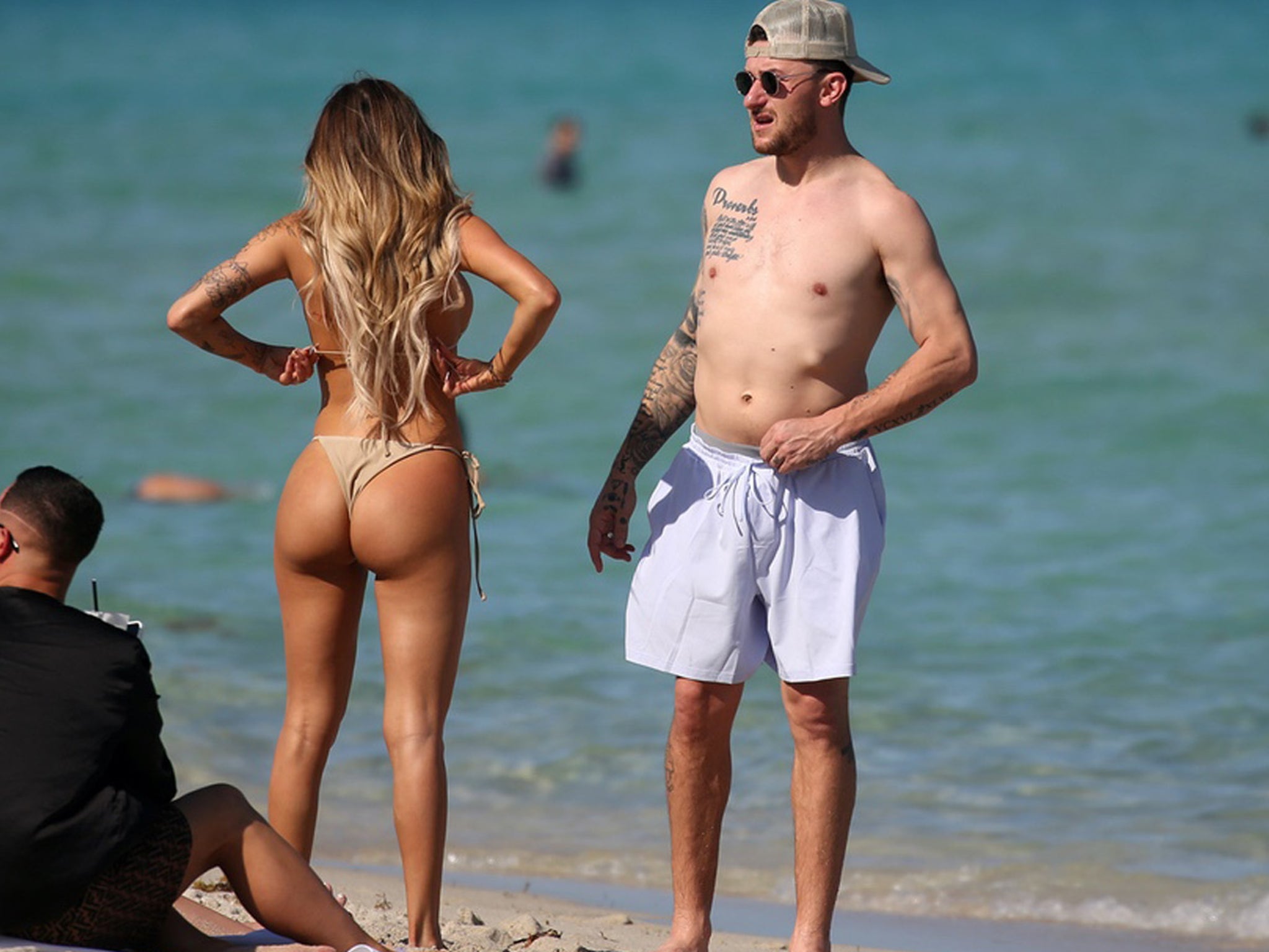 Johnny Manziel Hangs With Bikini Model, Throws Football After Announcing Comeback