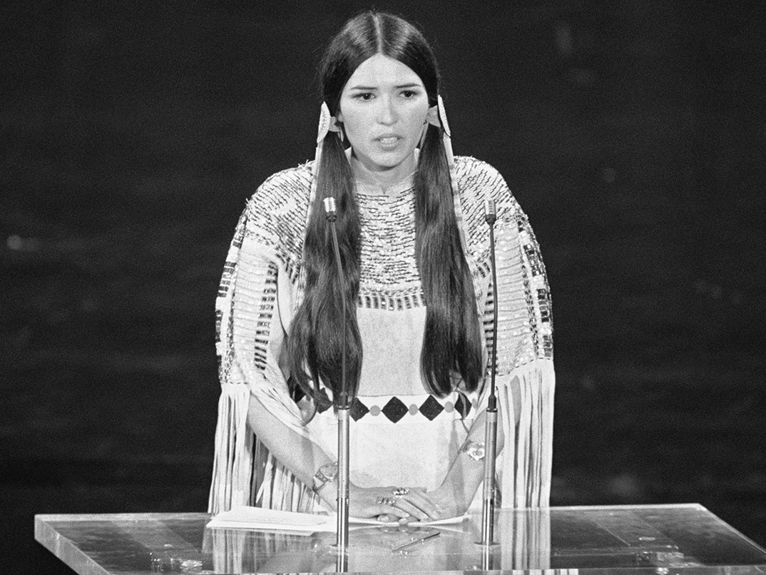 Sacheen Littlefeather -- born Marie Louise Cruz -- speaks at the 45th Academy Awards. On behalf of Marlon Brando, she refused the Best Actor award he was awarded for his role in 'The Godfather'. Brando refused the award because of the treatment by the Americans of the American Indian.