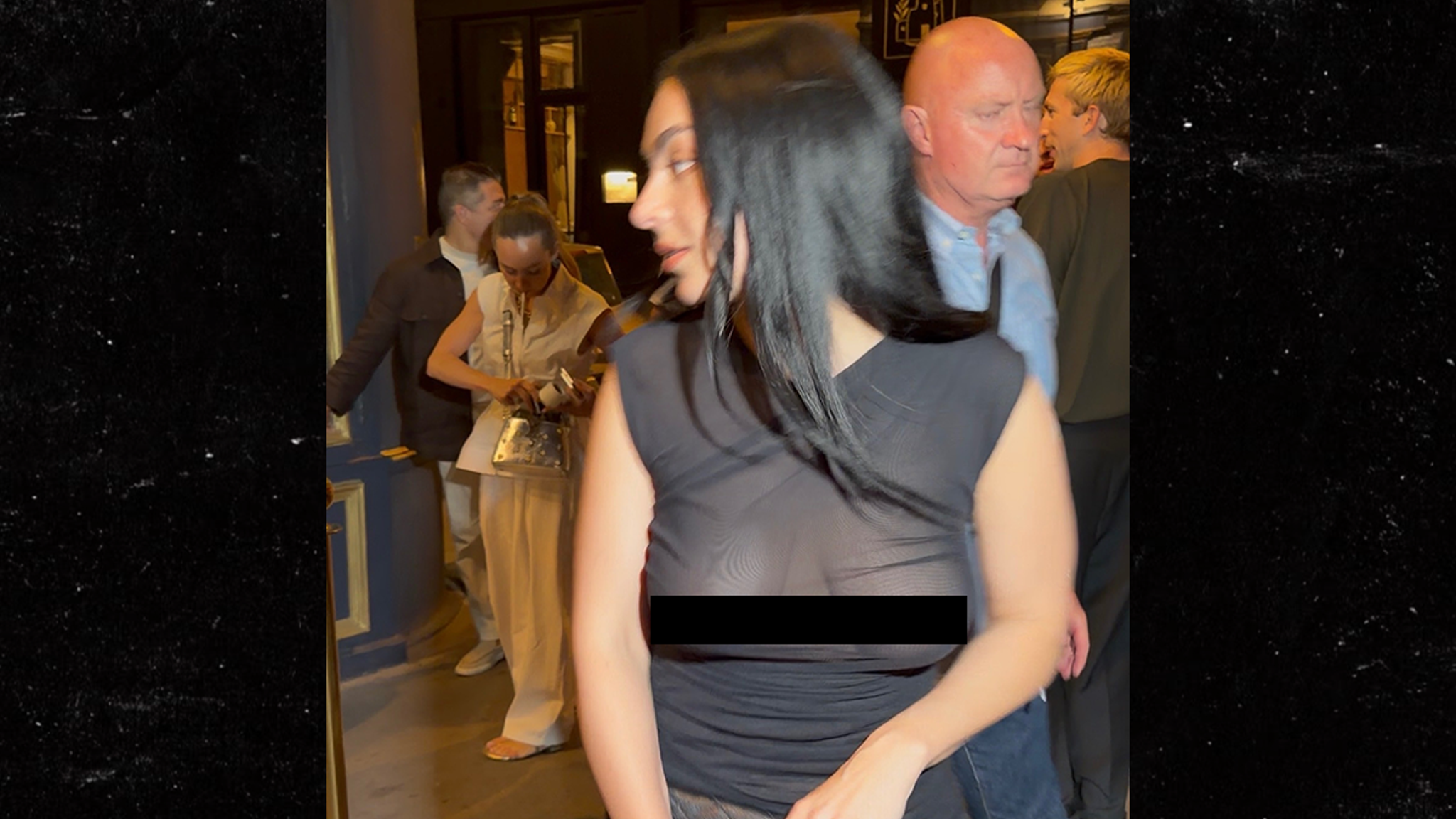 Charli xcx Wears See-Through Top During Paris Fashion Week