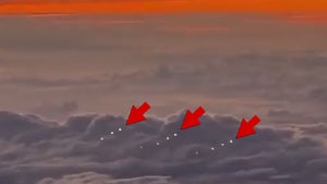 Pilot Records Fleet of 'UFOs' While Flying Over Pacific Ocean