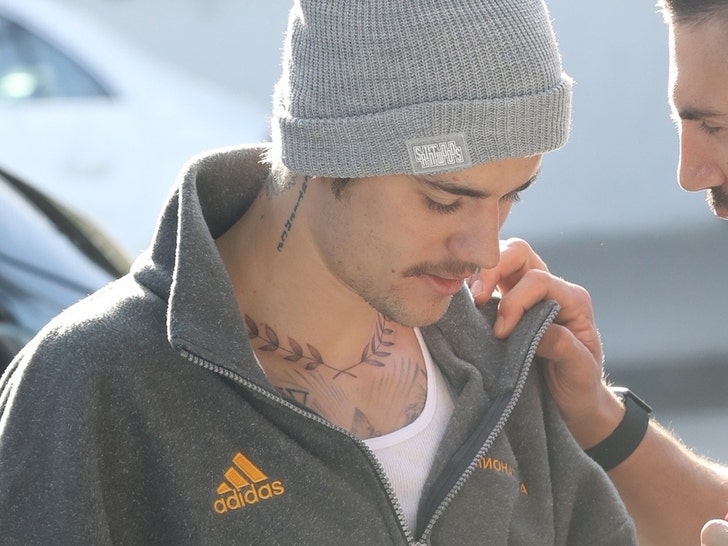 Justin Bieber Shows Off New Laurel Wreath Tattoo Across Collar