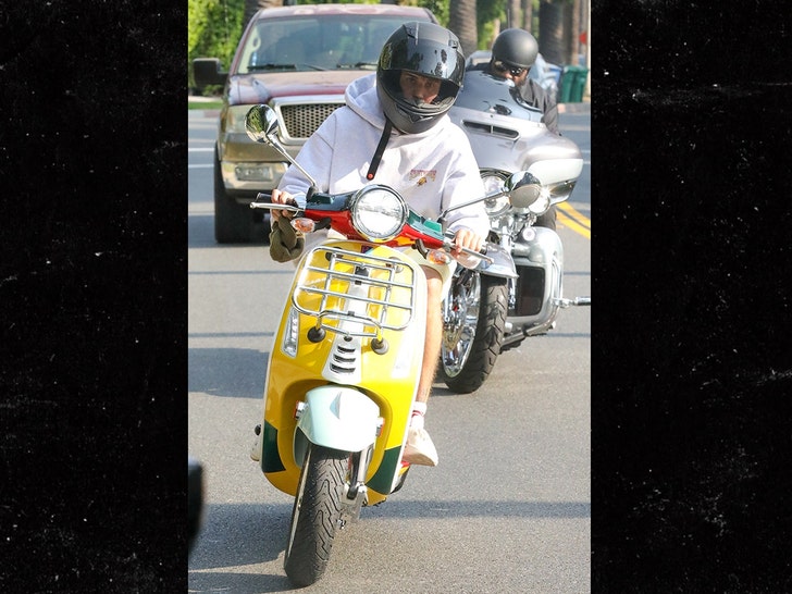 Justin Bieber Joy Riding Yellow Vespa 