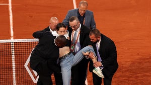 Protester Ties Herself To Net During French Open Men's Semi-Final, Halts Play