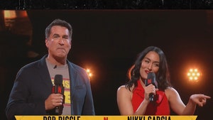 Rob Riggle, Nikki Garcia