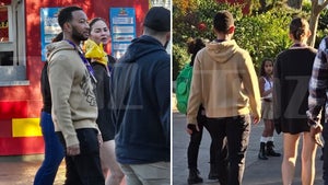 Chrissy Teigen and John Legend with their kids at legoland