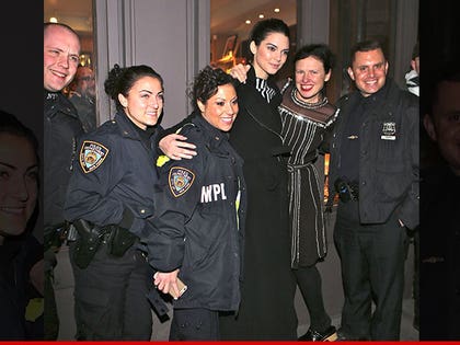 0215-kendall-jenner-pose-police-book-marc-SPLASH-01