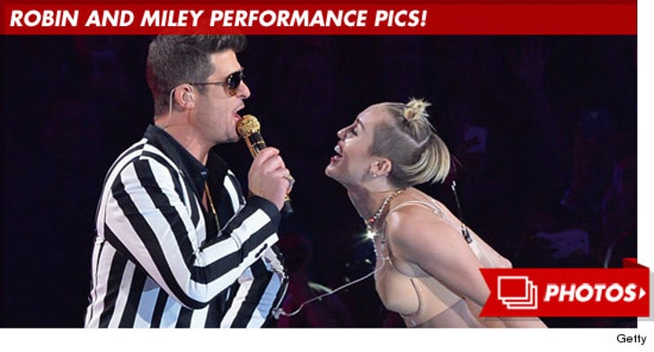 Miley Cyrus and Robin Thicke Performance Photos!