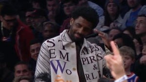 Kyrie Irving Watches Nets Game from the Stands, LeBron Slams Policy