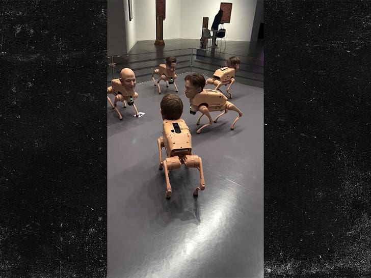 120425_robots_billionaire_faces_exhibit