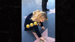 Reese Witherspoon Cleans Her Own Star on the Hollywood Walk of Fame
