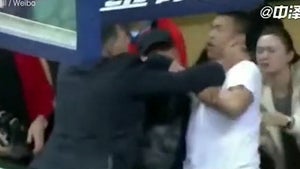 010220-coach-hits-fan-primary-2