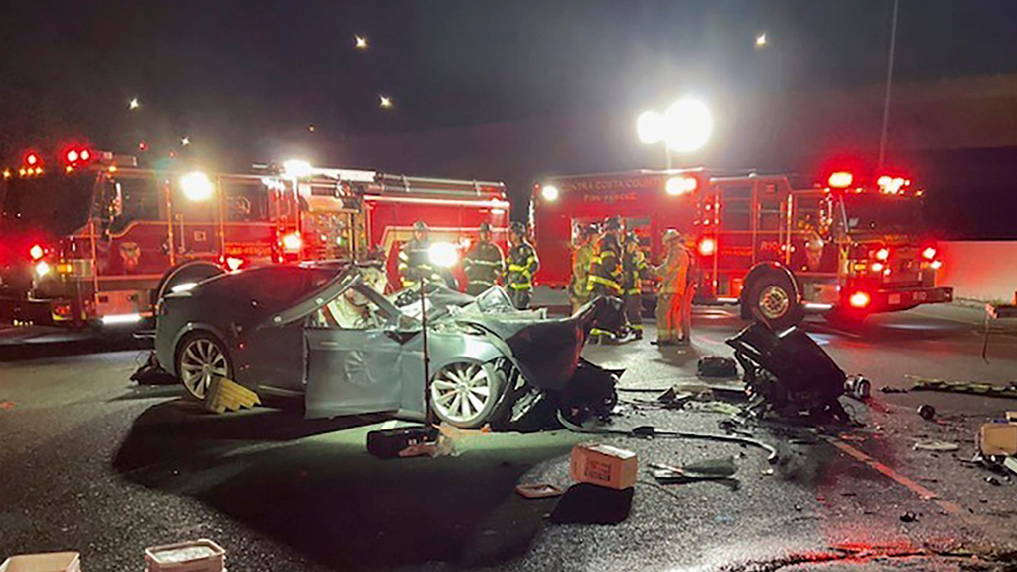 Tesla Driver Dies After Ramming Into Firetruck Amid Mass Recall